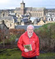 Dauvit Brown with Dunblane Cathedral in ther background